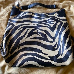 Used large animal print Dooney Burke handbag